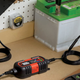 Illustration for article titled $15 Battery Charger, Portable Inflator, $5 Amazon Credit, iTunes Cash